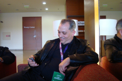 20.-Matze-in-hotel-lobby-posting-on-Facebook